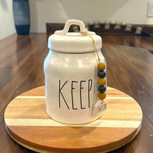 RAE DUNN KEEP CANISTER WITH ENJOY TASSEL